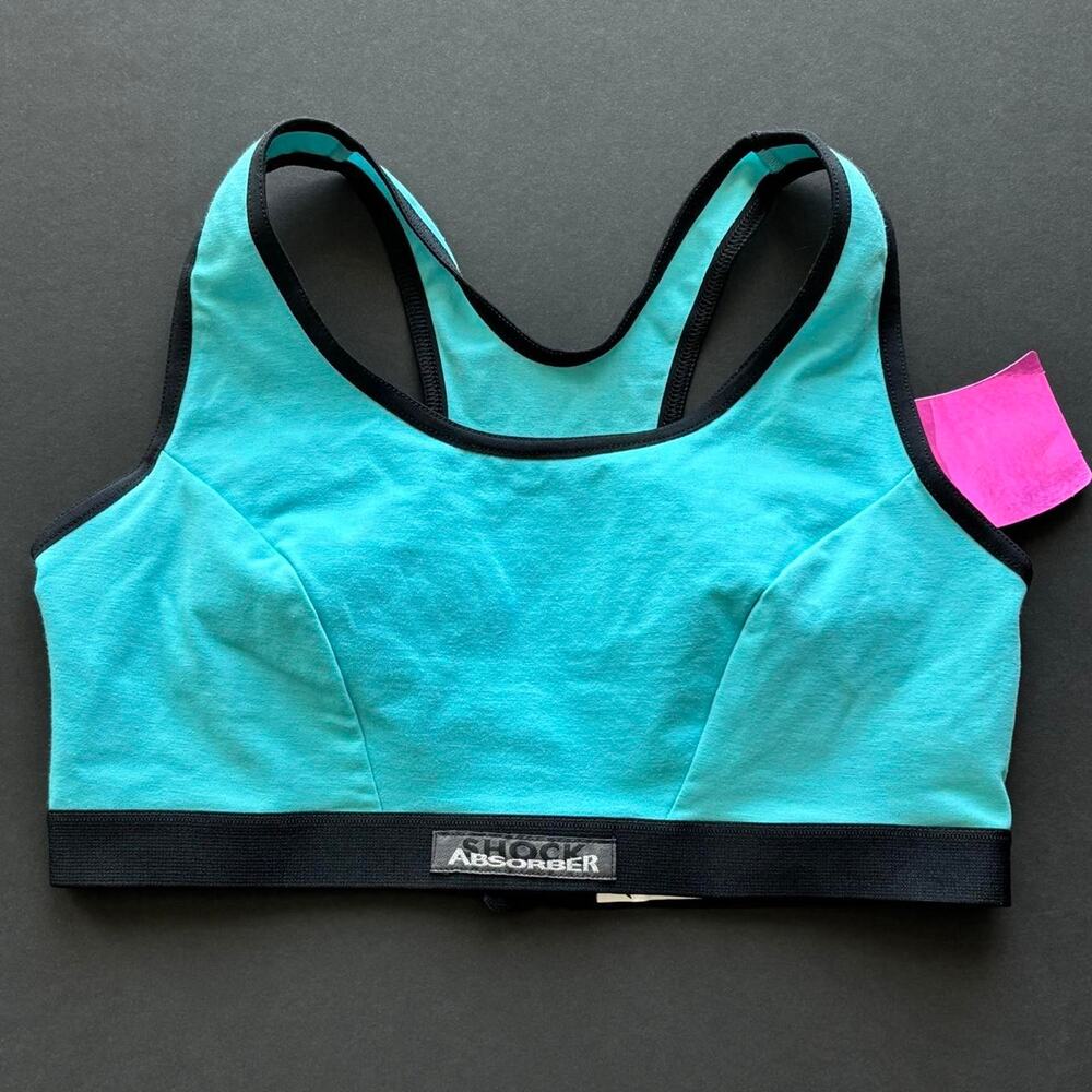 Shock absorber teal sports bra color- size small NWT